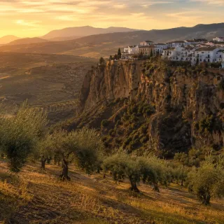 Whitewashed Andalusian hilltop village above a cliff