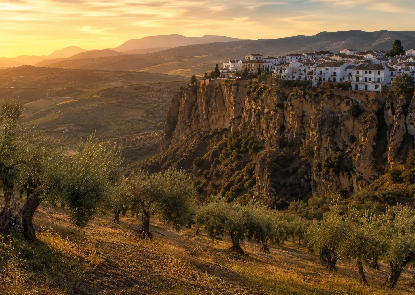 Whitewashed Andalusian hilltop village above a cliff