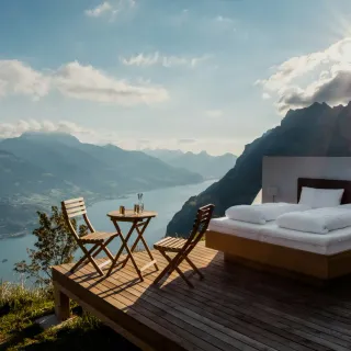 Outdoor bed and breakfast table on a cliffside deck