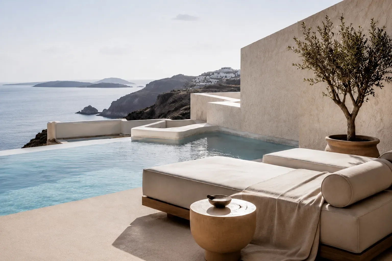 Serene Mediterranean terrace with an infinity pool overlooking the sea