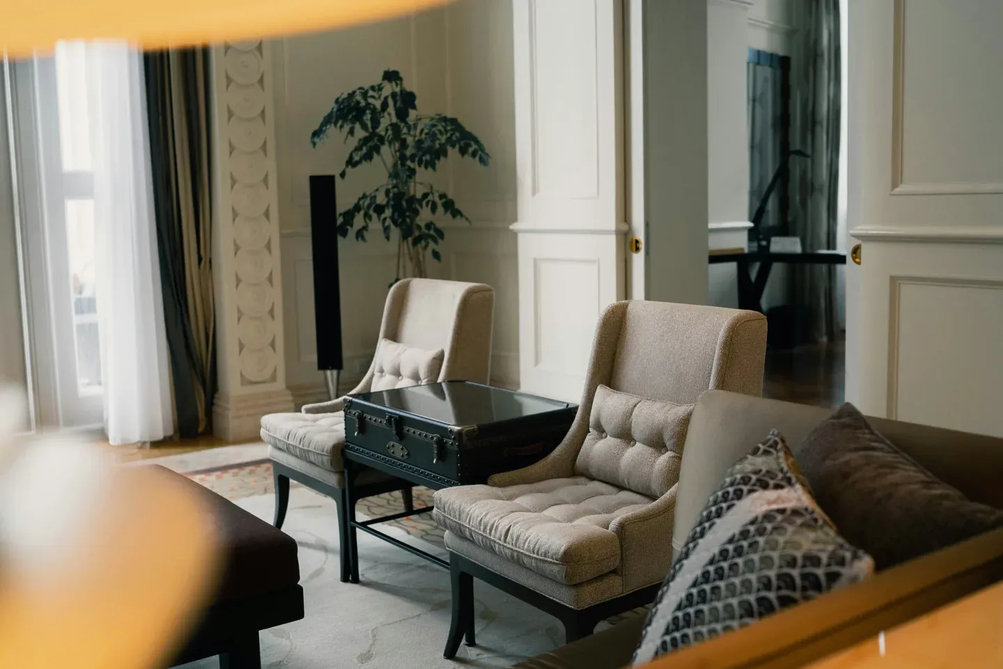 Pair of armchairs around a small interview table