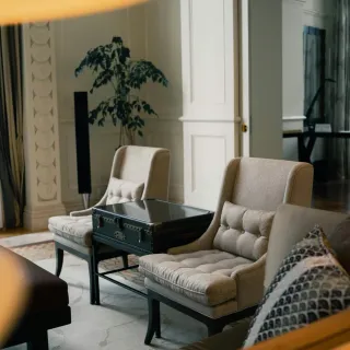 Pair of armchairs around a small interview table